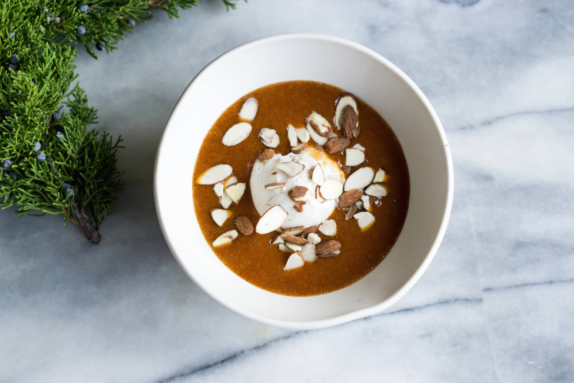 Recipe for healthy Nordic rosehip soup with almonds and ice cream